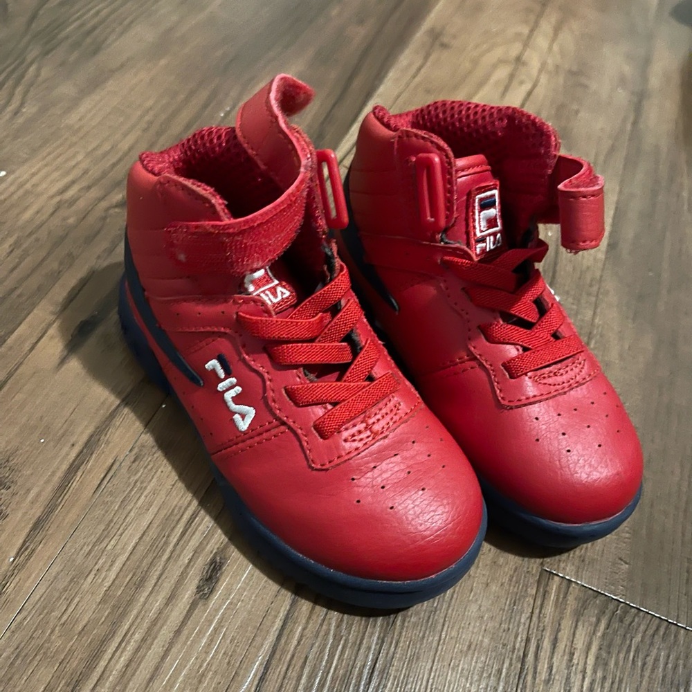 Red FILA sneakers